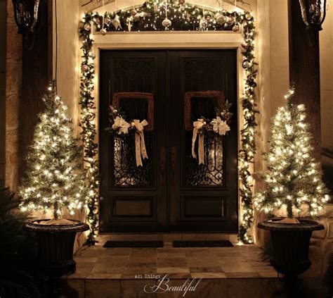 Added a little more decor than normal on my porch this year. Christmas Porch and Front Door Garland DIY | Hometalk