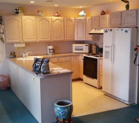 Limed oak cabinets (which, from our research is the more modern term for the pickled oak cabinets you may remember from the 80's.) are making, in our eyes, a bit of a comeback. Need help with wall color in beach house -- have pickled ...