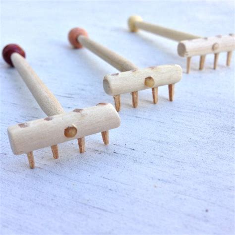 Aside from the natural rocks that represent mountains, you can also build a meditation tower of rocks. Mini Wooden Zen Garden Rake 3x1 by TeMadeDesigns on Etsy ...