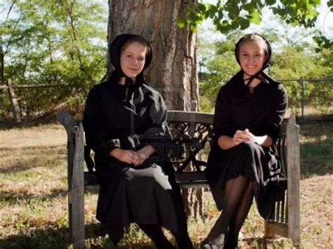Two Amish Girls On The Bench Amish Amish Culture People