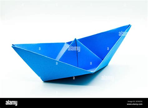 Blue Folded Paper In The Shape Of A Boat Easy And Satisfying Origami