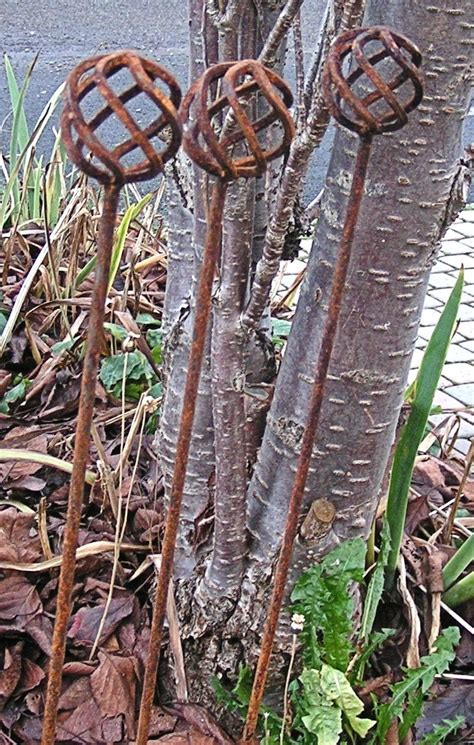 A Set Of 3 Natural Rusting 3 Metal Plant Supports Spiral Etsy