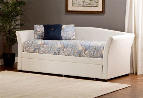These beds are treated as any normal bed, but can be wheeled out for being offered to an overnight guest as another bed. Hillsdale Montgomery Daybed with Trundle - White PU ...