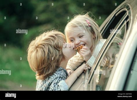 Funny little couple saying goodbye before car travel. Bye bye. Farewell