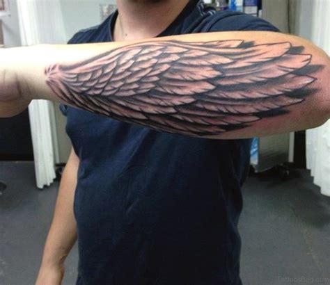 30 Awesome Wings Tattoos On Arm Tattoo Designs