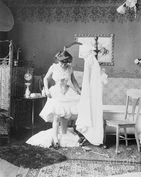 Victorian Woman Undressing In The Bath Photograph By Bettmann Pixels