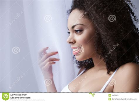 Cheerful Mulatto Woman Is Relaxing At Home Stock Image Image Of Light