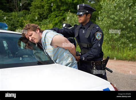 Police Officers Arresting Suspect Stock Photo Alamy