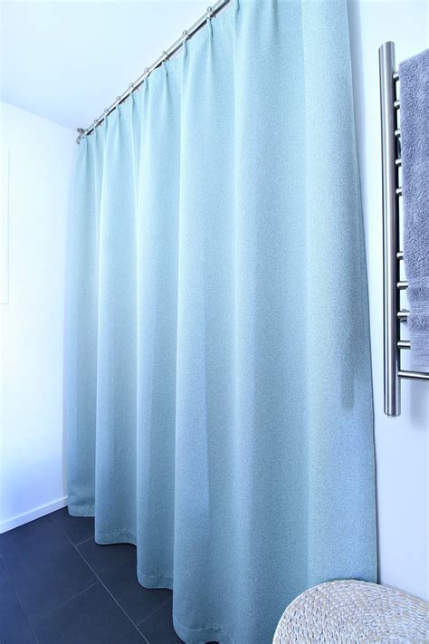 The hanging shower rod is a neat and cheap alternative for a different look to your bath. Bathroom Update: Ceiling Mounted Shower Curtain Rod ...