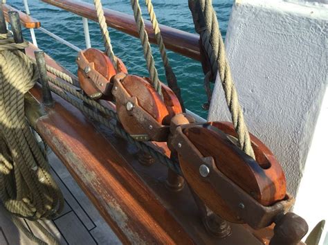 The Ropes Are Attached To The Deck Of A Boat