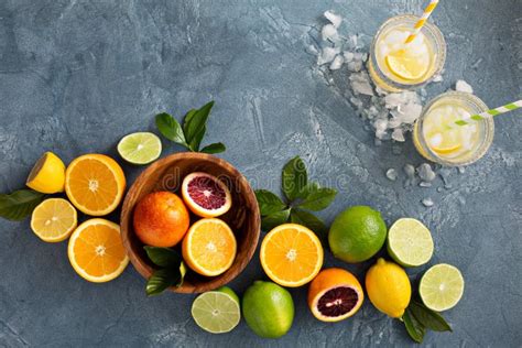 Citrus Fruits Background With Oranges Limes And Lemons Stock Photo