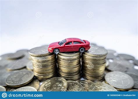 Gold loan is offered to meet urgent cash requirements by submitting gold, gold ornaments/jewellery/coins as collateral or security with the bank or lender. Toy Cars With Gold Coins Show To Growth, Saving Money For Car Loans Stock Photo - Image of cars ...
