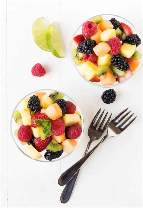 Try this simple to prepare salad with mango, pomegranate, shredded fruits are a great source of energy and packed with flavour. Fruit Salad with Lime Mint Dressing - Garnish with Lemon