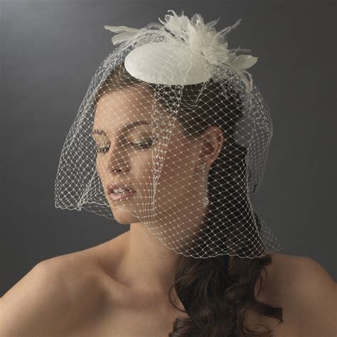 vintage bridal hat with bird cage face veil and flower adornment elegant bridal hair accessories