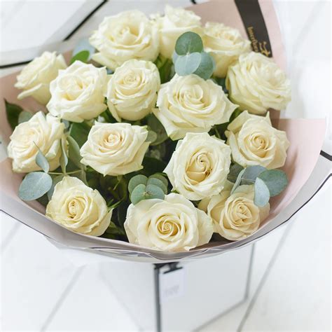 beautifully simple white rose bouquet ireland interflora eesti flower delivery