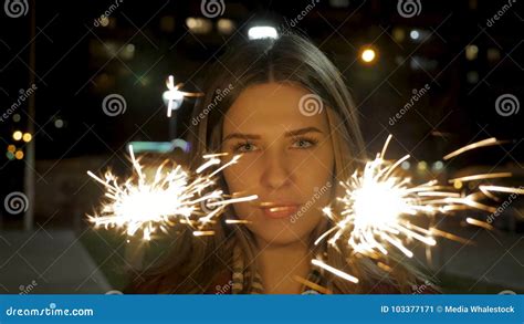 Beautiful Smiling Young Woman Holding A Sparkler Night Scene Young
