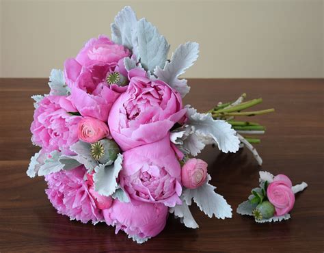 Bridal Bouquet With A Matching Boutonniere Peonies Ranunculus Dusty
