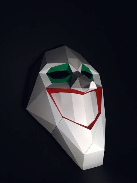 An Origami Mask Made To Look Like The Joker S Face Is Shown