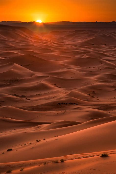 Moroccan Sunset The Sun Setting Over The Sahara Desert In Morocco