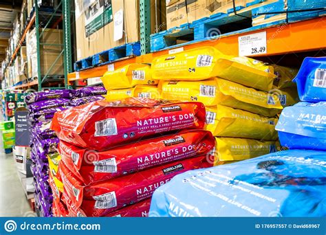 In america, most dry and canned dog food is made in the u.s. Dog Food at costco editorial photography. Image of care ...