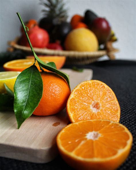 Orange Fruit On Black Surface Photo Free Food Image On Unsplash