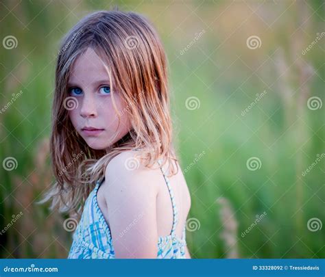 Serious Little Girl In Field Stock Photo Image Of Blonde Grass 33328092