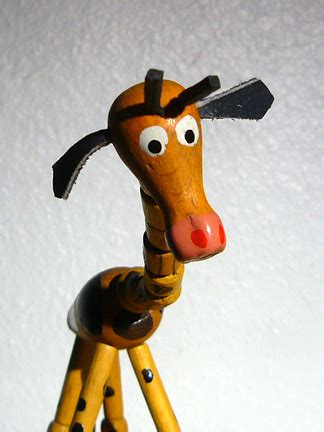 This toy was manufactured by a company known as petra toys and is discontinued. Charmayne's push puppet page, Giraffe gallery