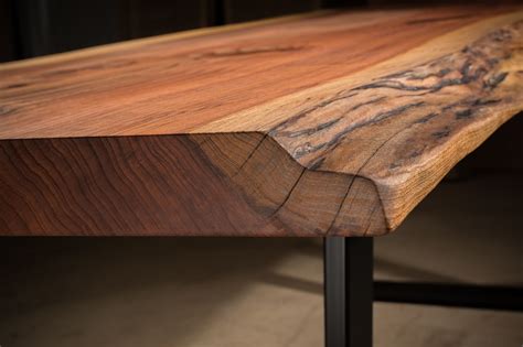 6 foot maple table with blue epoxy resin river $ 2,500.00 read more; Redwood kitchen table with live edge | Live edge dining table, Dining table, Furniture