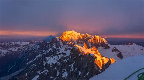 Download 1366x768 Wallpaper Glacier Mountains Peak Glow Nature