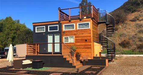 If you want to tame a slope in your backyard, a raised deck or platform deck can help with backyard access. Fabulous Tiny House With Rooftop Deck | Sia Magazine