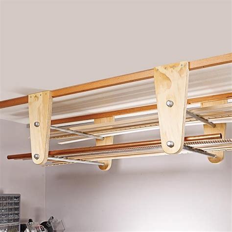 Of storage, and the rack holds up to 350 lbs of evenly. Overhead Storage Rack | Overhead storage rack, Overhead ...