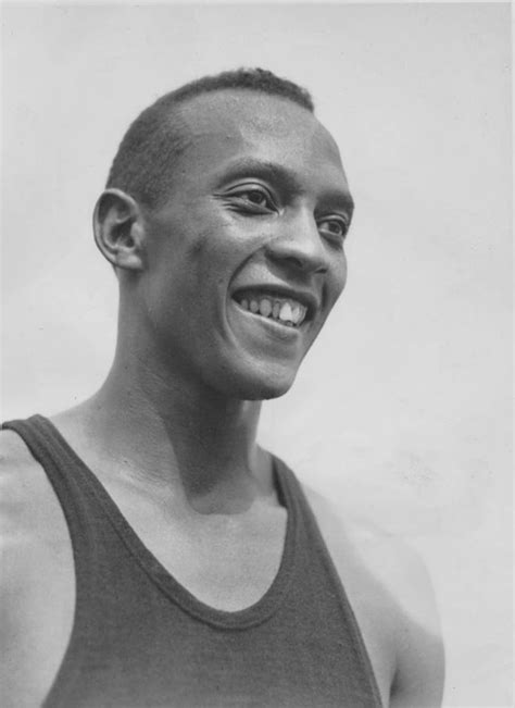 9 photos of jesse owens at the 1936 olympics show what an american hero looks like