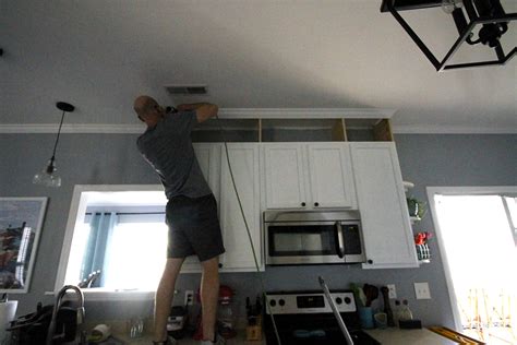 Get rid of the gap above kitchen cabinets. How to extend kitchen cabinets to the ceiling • Charleston ...
