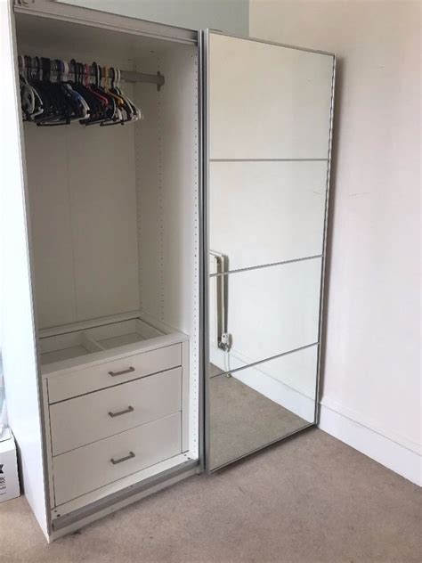 Our pax wardrobe is rockin' some fancy doors right now… in our mudroom ikea pax wardrobes provided the perfect storage solution. Ikea Pax double wardrobe with sliding mirrored doors | in ...