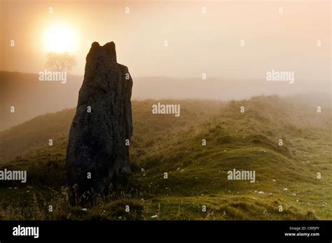 Dawn Over A Standing Stone Part Of The Avebury Ring The Oldest Stone