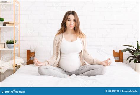 Calm Young Pregnant Woman Meditating In Bed Stock Image Image Of Motherhood Belly 170820901