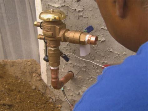 After the 15 minutes are up, take a ruler and measure how much water is in the zone's cans. 10 Things You Must Know About Sprinklers | DIY