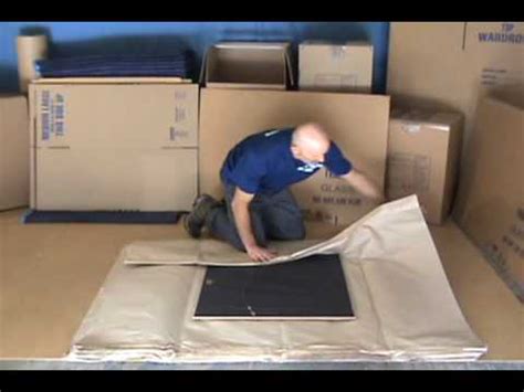 By wrapping any items containing glass or ceramics in paper or bubble wrap. How To Pack Pictures and Glass - Movers-Moving.NET - YouTube