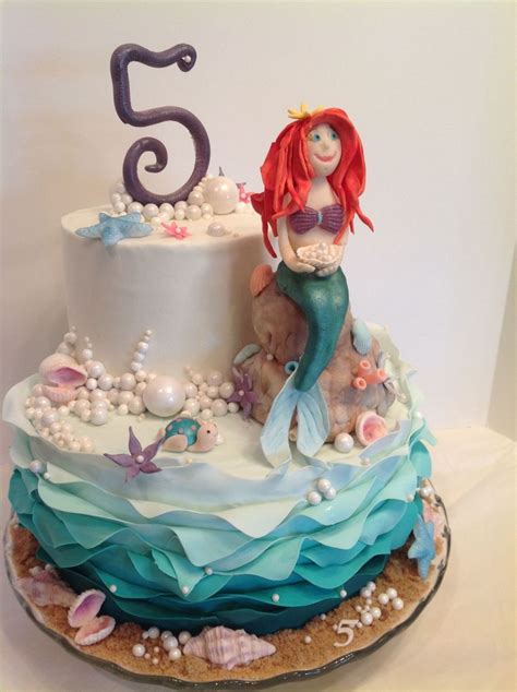 If you did the petals with cream or blush or white frosting, it could be a super cute wedding cake. Ariel The Mermaid - CakeCentral.com