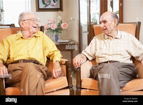 Senior Men Relaxing In Armchairs Stock Photo Alamy
