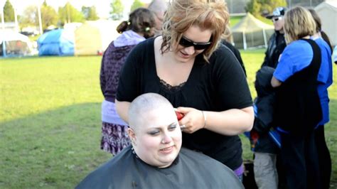 Woman Getting Her Head Shaved At A Charity Event In Shave Her Head Summer Haircuts