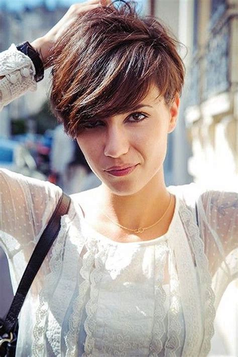 The short length gives the locks an impression of a thicker density. Funky short pixie haircut with long bangs ideas 106 ...