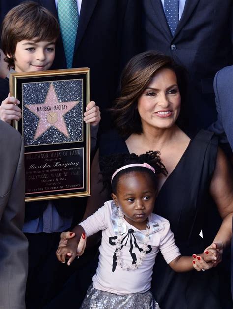 Mariska Hargitay Holds Her Adopted Daughter Amaya As Her Son August Holds A Replica Plaque