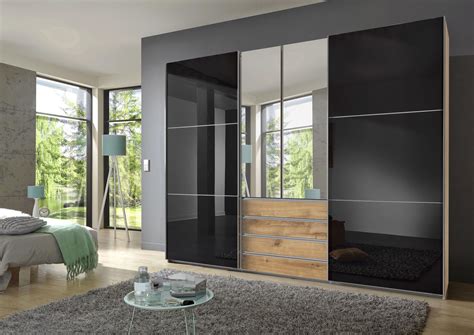 Räume mit dachschrägen haben eine gemütliche atmosphäre. kleiderschrank buche massiv | schwebetürenschrank nolte ...