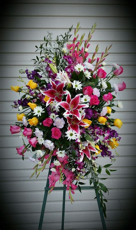 Send fresh funeral & sympathy flowers to comoros: Pinks, yellows, purples and whites make for a very ...