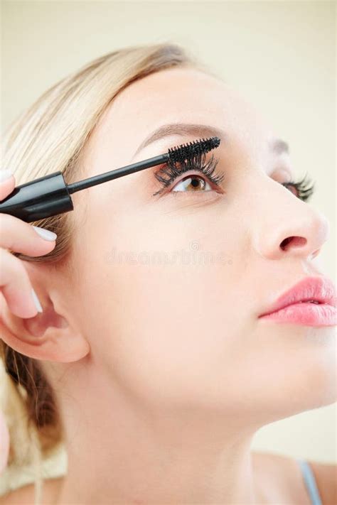 Woman Applying Black Mascara Stock Image Image Of Adult Cosmetics