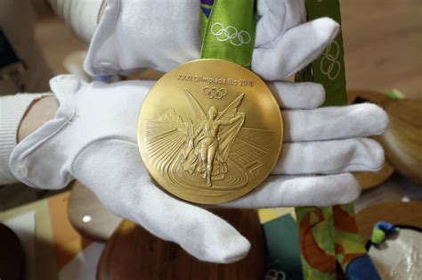 That's nearly 30 times more money than michael phelps or any other u.s. Gold medals in Rio are barely gold at all. Here's why. - Chicago Tribune