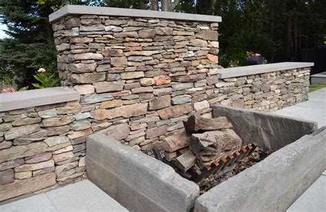 Stone fire pit via personal touch lawn care inc. Bluestone Fire Pit | Fire pit, Fire, Bluestone