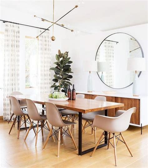 Store away your dishes within its generous storage compartments, and top with candles or lamps to create a refined focal point in your dining room's design. Healing Iinterior Spaces Using Round Mirror - TRADUX MIRRORS