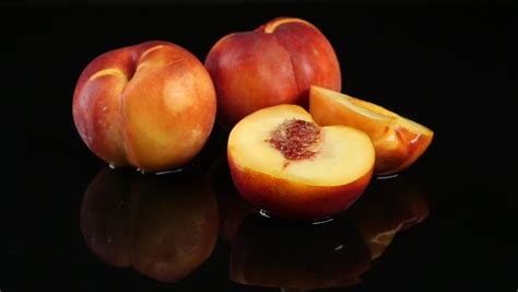 Broken examples have been found in san francisco and a few examples have even been found under buildings in new hampshire. Peach Falls On The Table With Water On A Black Background ...